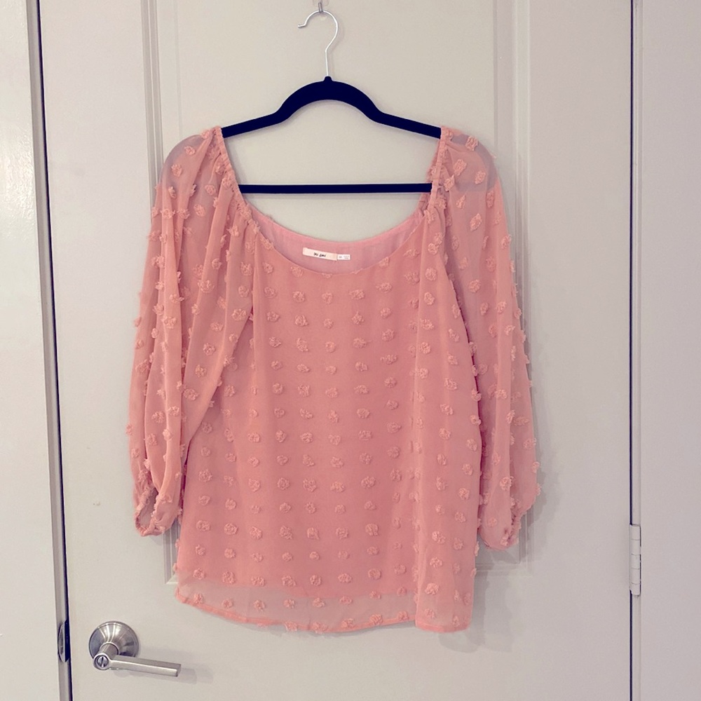 Pink long sleeve womens shirt.